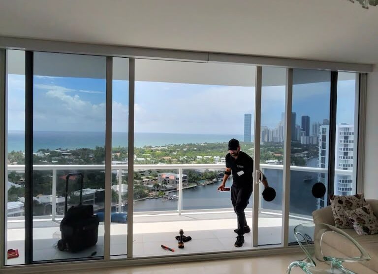 Sliding glass door fully operational after track repair by Sliding Doors Pro — ocean view condo Fort Lauderdale